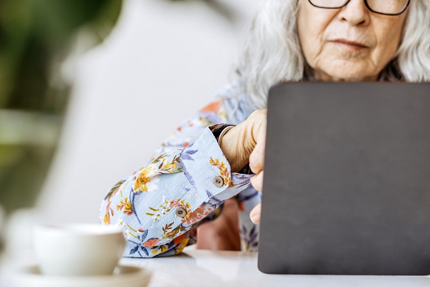 Senior woman working on a laptop